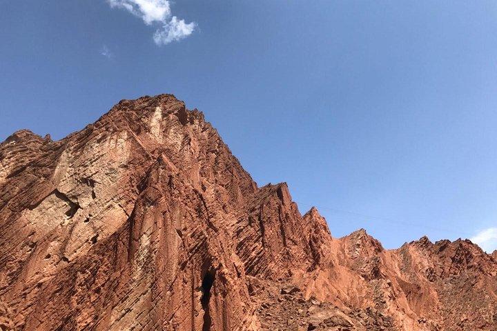 Private Day Tour to Kizil Caves and Tianshan Canyon from Urumqi by Air