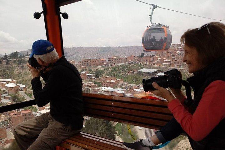 From La Paz: Cable car ride tour with tasting food.