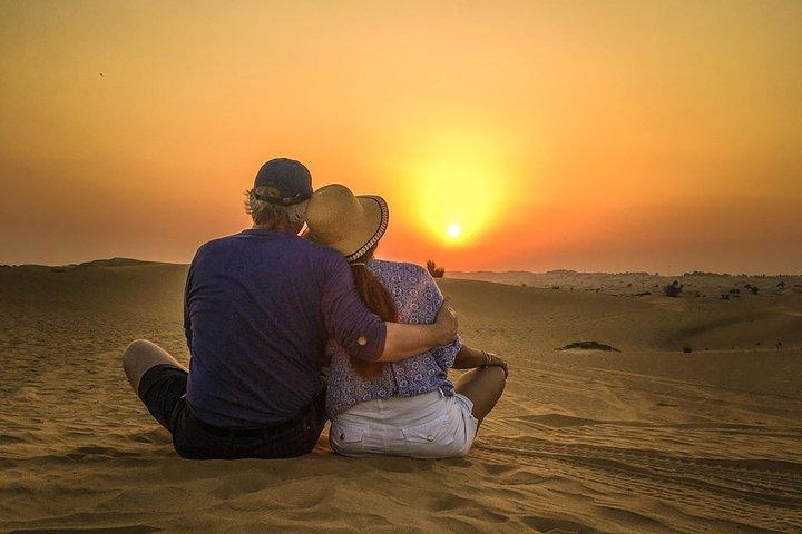 Doha Sunset Safari: Camel Trek with Dune Bashing and Sandboarding