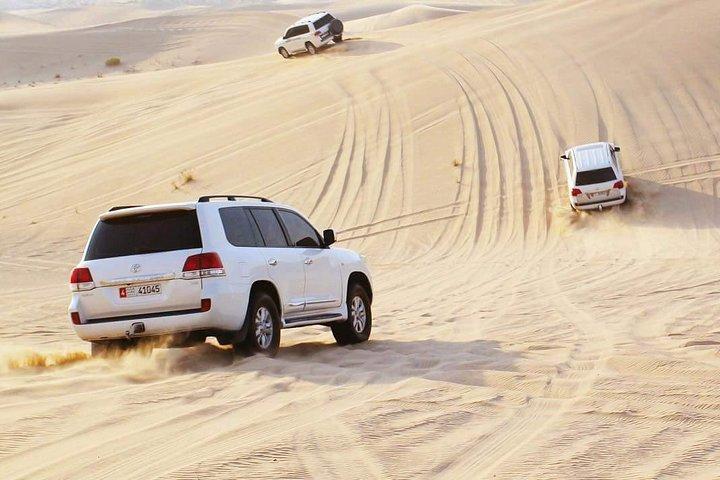 Morning Desert Safari with Camel Ride & Sand Skiing Private Tours