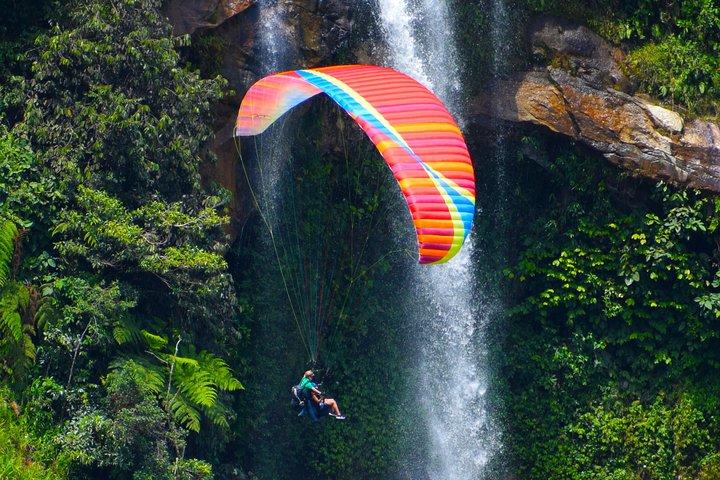 PARAGLIDING over giant waterfalls private tour (optional Guatape) from Medellin