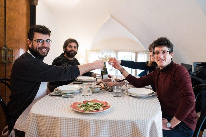 Dining experience at a local's home in San Gimignano with show cooking