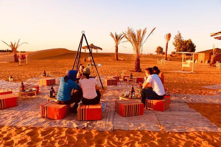 Merzouga: Overnight in luxury desert camp with Camel Ride, meals & sandboarding