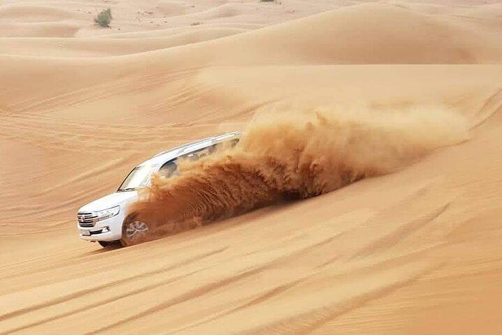 Dubai Red Dunes Desert Safari Sandboard, Dinner Buffet & Shows