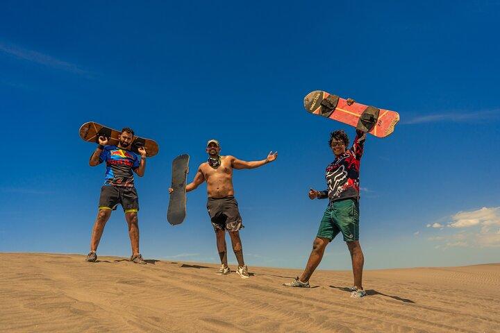 Sandboarding at the Mogote Dunes