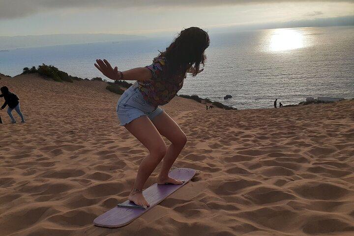 Sandboarding and sunset in Concón