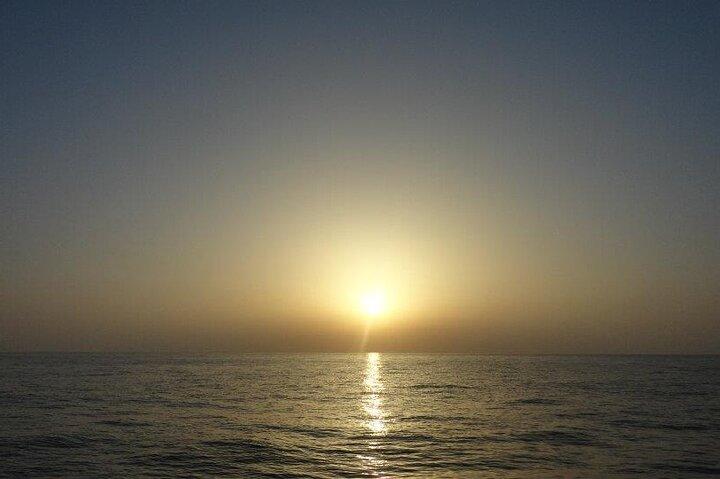 Sunrise by boat in Lipari