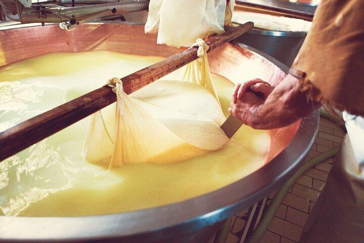Guided Tour at the Cheese and Ham Factory in Parma
