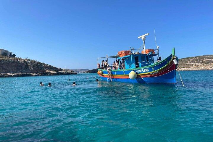 Boat charter and Boat trips around Comino and Maltese islands