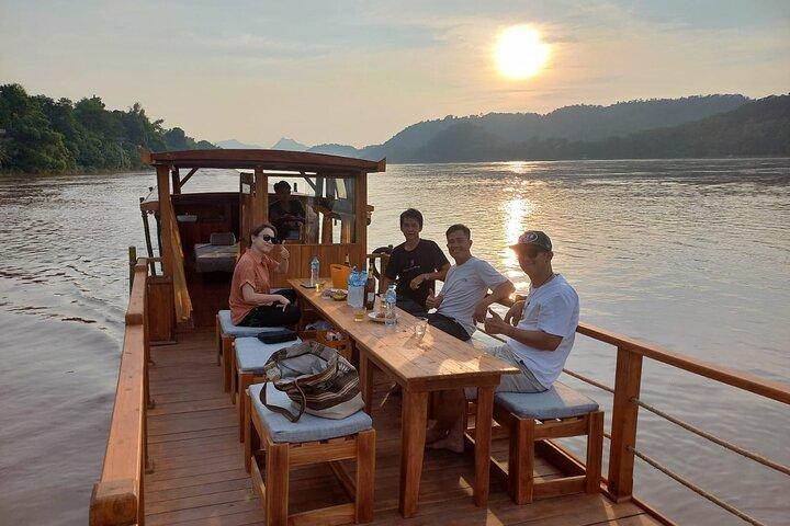 Luang Prabang Mekong Sunset Cruise and Hot Pot Dinner