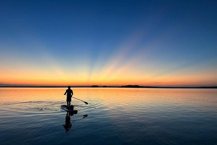 Sunrise on Paddleboard with breakfast in the lagoon of 7 colors