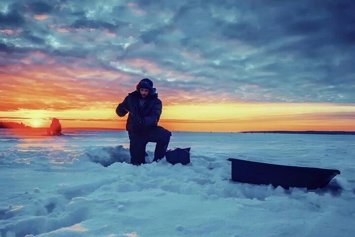  Ice-fishing in Levi with making a Finnish fish soup